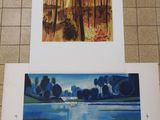 two paintings of trees and a body of water on a tile floor