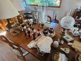 a wooden table with a lot of items on it