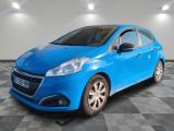a blue car is parked in a room with a checkered floor