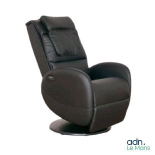 the recliner chair is made of leather and has a foot rest