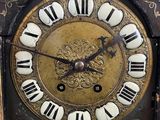 a clock that is sitting on top of a table