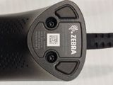 a close up of a remote control on a table