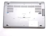 a laptop that is sitting on a white surface