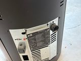 a water heater that is sitting on the floor