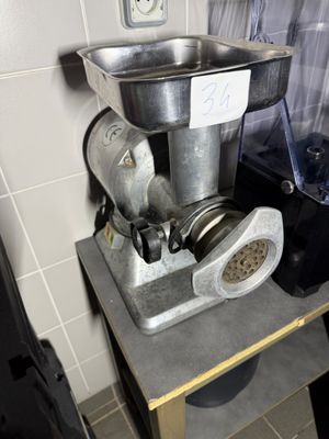 a machine that is sitting on a table in a kitchen
