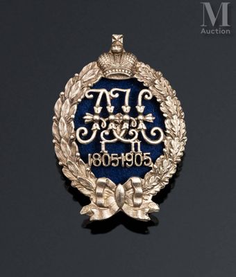 a close up of a badge on a black surface
