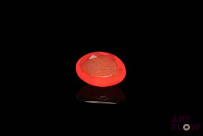 an image of a red object on a black surface