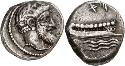 a silver coin with an image of a man and a woman on it