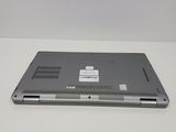 a laptop that is sitting on a white table