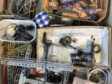 a box of assorted electronics in it on the floor