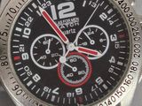 a close up of a watch on a table