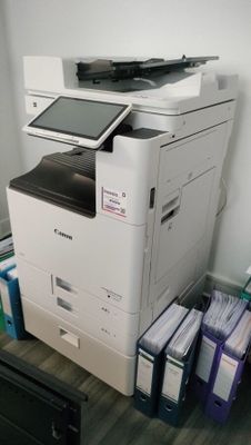 a printer that is sitting on top of a desk