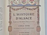 an open book with a picture of a vase on top of it