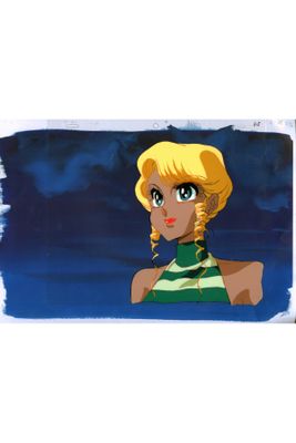 an image of a woman with blonde hair and a green and white striped shirt