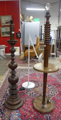 two lamps that are sitting on a rug in a room