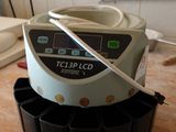 an iceberg machine sitting on a counter in a kitchen