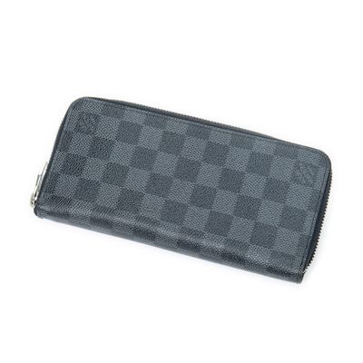 LOUIS VUITTON - PORTEFEUILLE modèle "Zippy vertical" en toil…