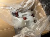 a plastic container with a white container inside of it