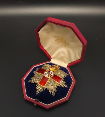 an image of a red box with a gold cross on it