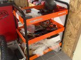 a small cart with tools on it in a garage