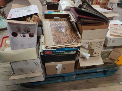 a pile of boxes sitting on top of a pallet