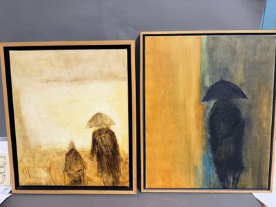 deux tableaux représentant un homme et une femme avec un parapluie