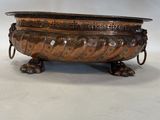 an antique bronze footed bowl on stand with handles