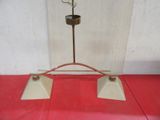 a lamp that is on top of a red table