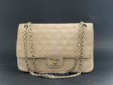 a chanel beige quilted leather shoulder bag with gold chain