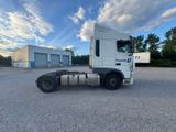 an image of a semi truck parked in a parking lot