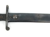 an image of a knife with a black handle on a white surface