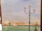 a painting of a man and a lamp post on a table