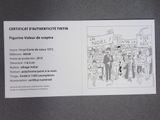a card with a drawing of a group of people on it