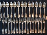 a lot of spoons and spoon spoons on the table