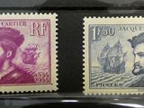 deux timbres avec la photo d'un homme et d'une femme