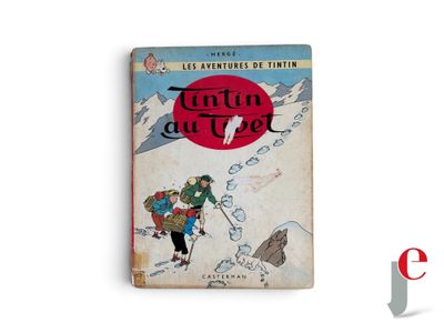 an old book with a picture of a man and a woman on a snow covered mountain