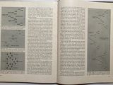 a book open to a page with a picture of a man