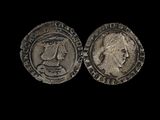 deux pièces d'argent, dont l'une représente la tête d'une femme et l'autre celle d'un homme