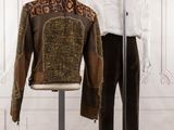 a mannequin and a jacket on display in a room