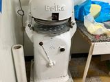 a machine that is sitting in the corner of a room