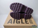 the purple nike air force is on top of a box