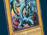 pokemon card of a blue - winged dragon with yellow eyes