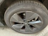 a close up of a tire on a car ' s rim