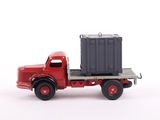 a toy truck with a container on the back of it