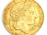 an image of a gold coin with a woman ' s head on it