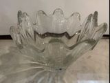 a glass bowl that is sitting on a table