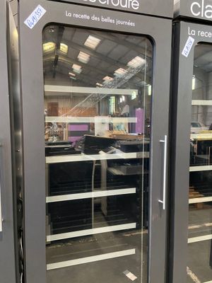 two glass doors that are open in a building