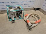 two hoses and a pump on the floor