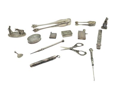 many different types of metal objects on a white background
