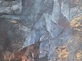 a painting of a bear that is laying down on the ground